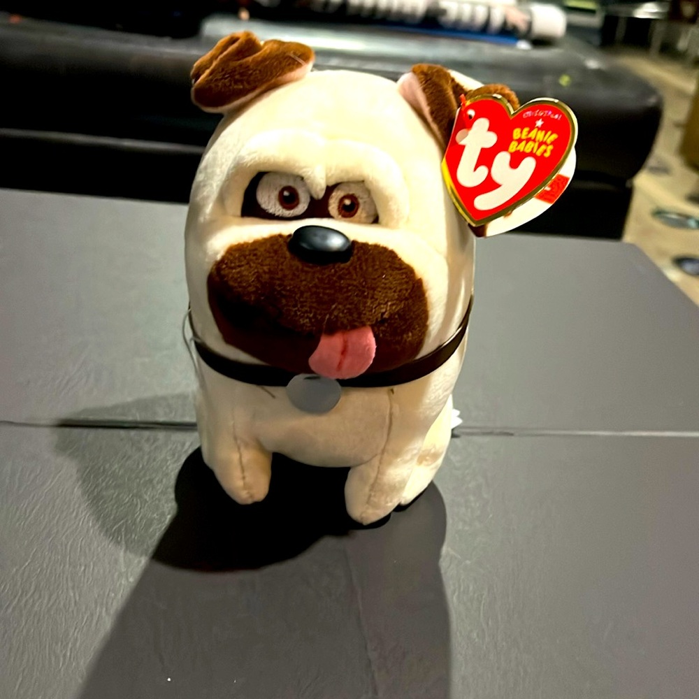 1 MEL the dog TY beanie baby DOG. With tags. Name. Etc.
